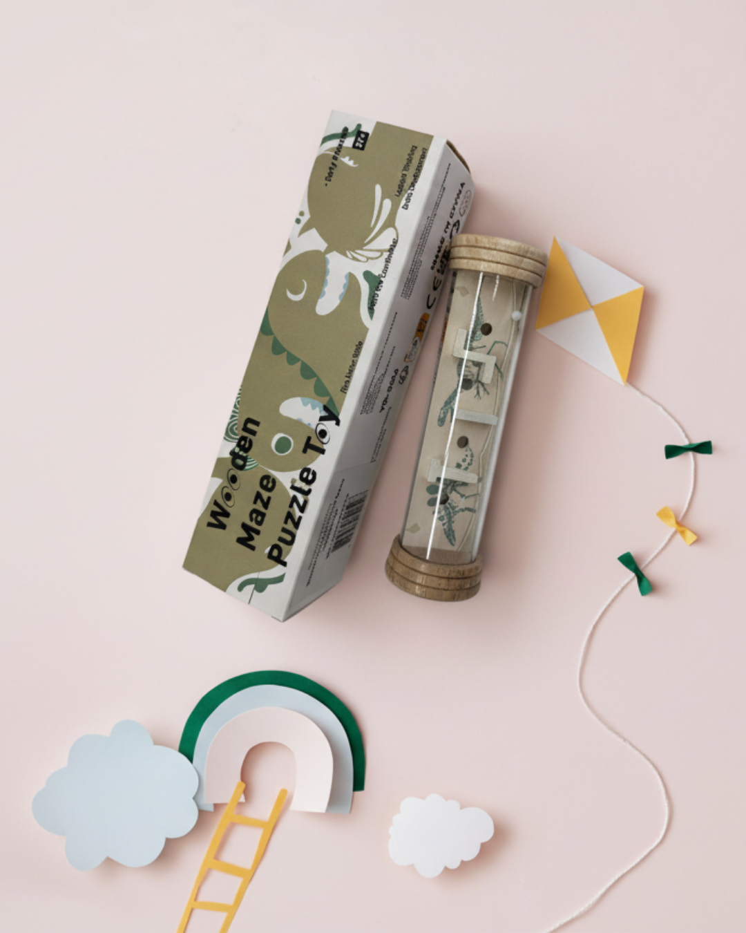 Dinosaur-themed Wooden Rolling Ball Maze Game with natural wood ends and cotton pouch.