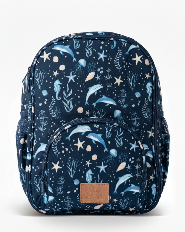 Navy blue backpack with ocean-themed pattern on a white background