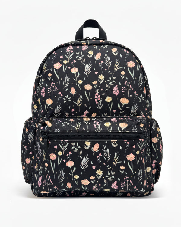 Floral-patterned backpack on a white background