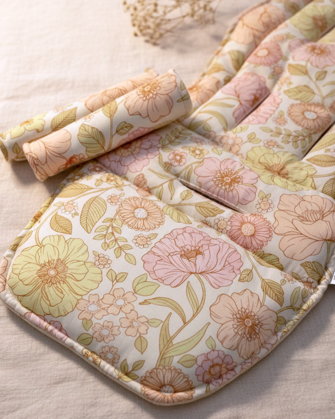 Floral-patterned cushions on a light background