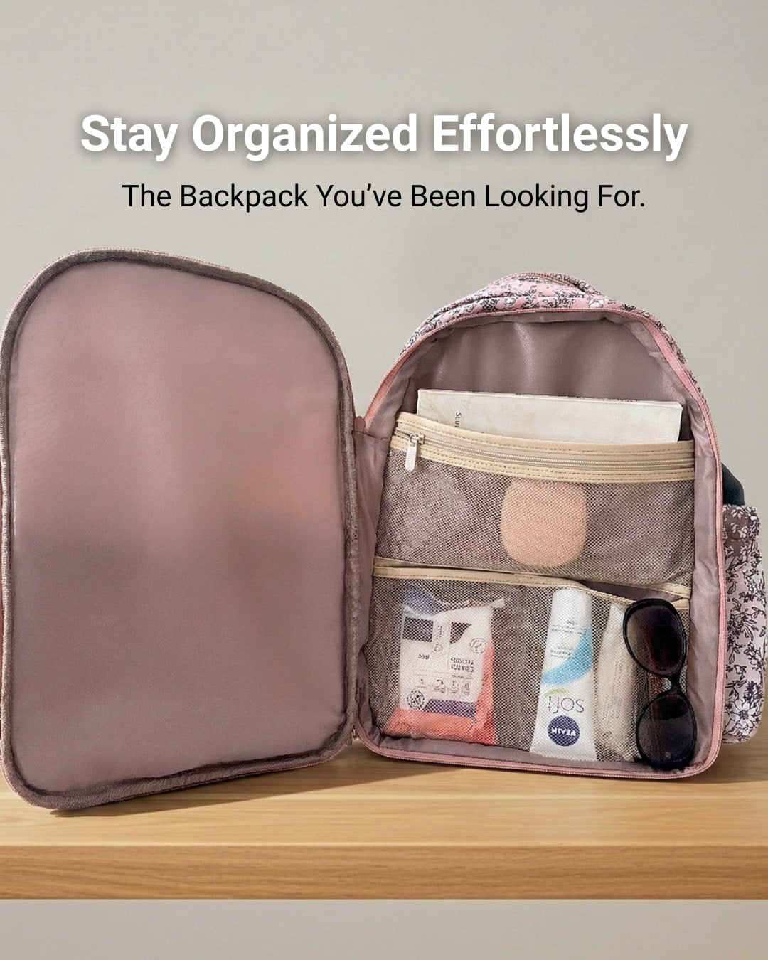 Open backpack with organized items on a wooden surface, promotional text above.