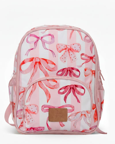 Backpack with pink bow pattern on a white background