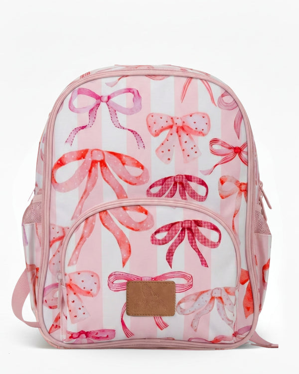 Backpack with pink bow pattern on a white background