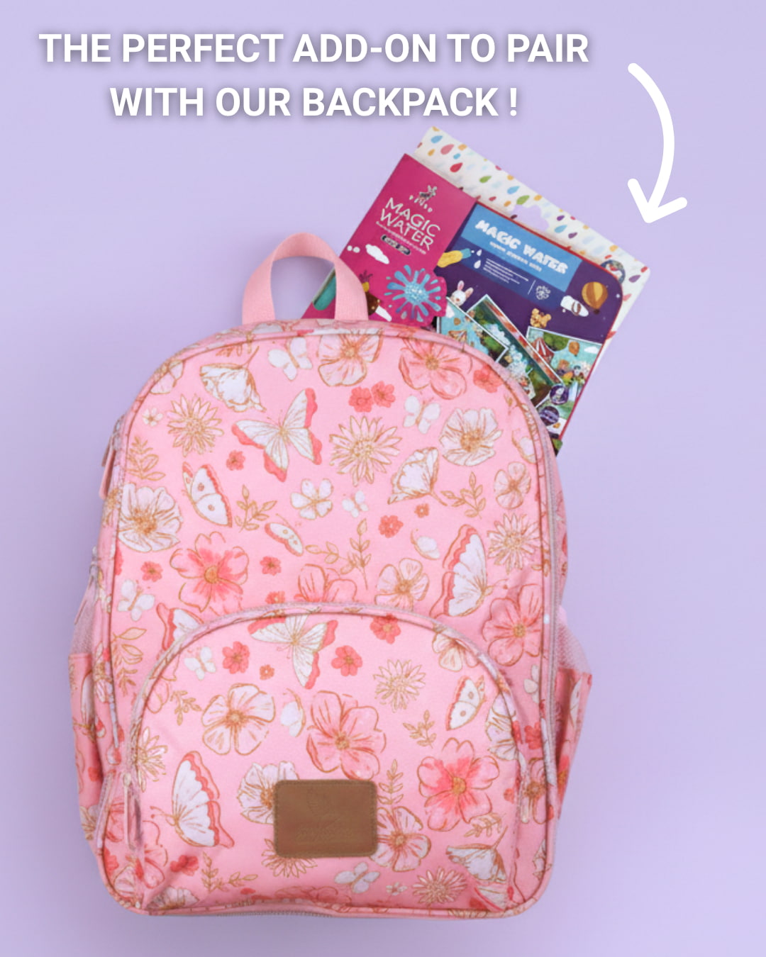 Pink floral backpack with a Magic Water toy on a purple background