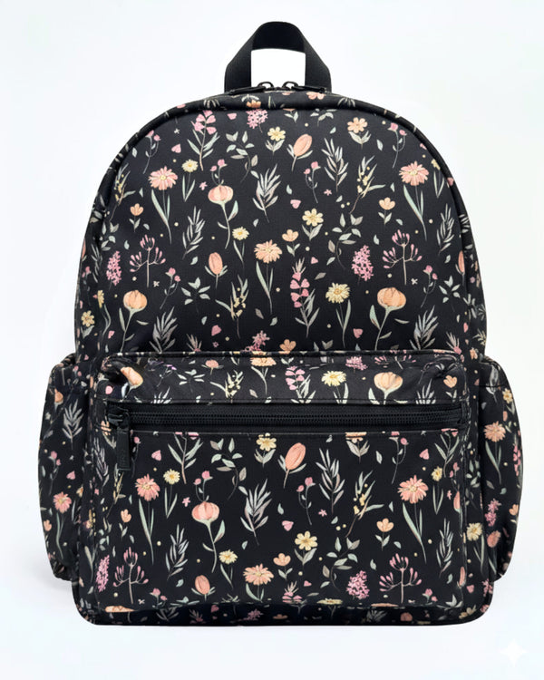 Floral-patterned backpack on a white background