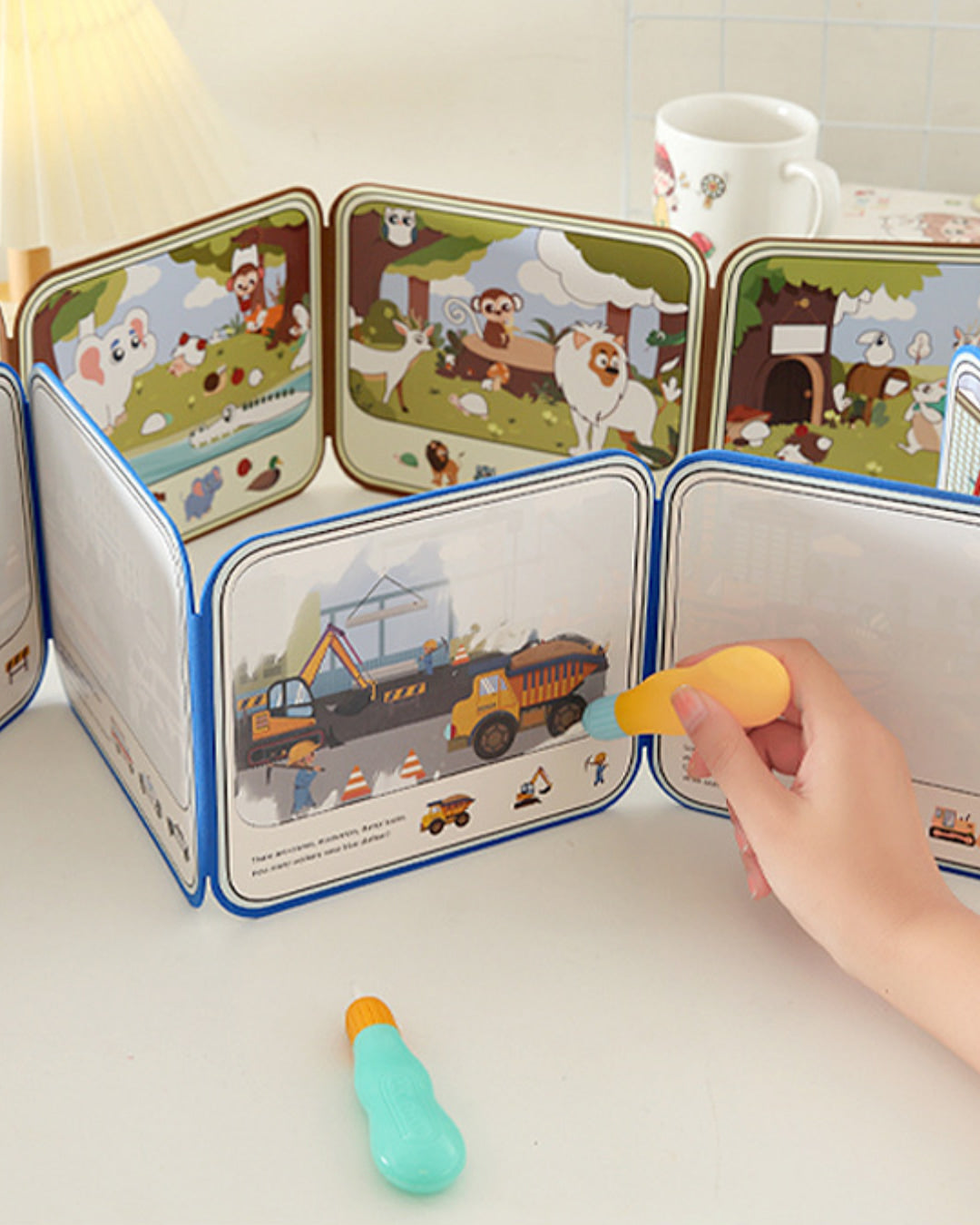 Children's book with interactive elements on a table