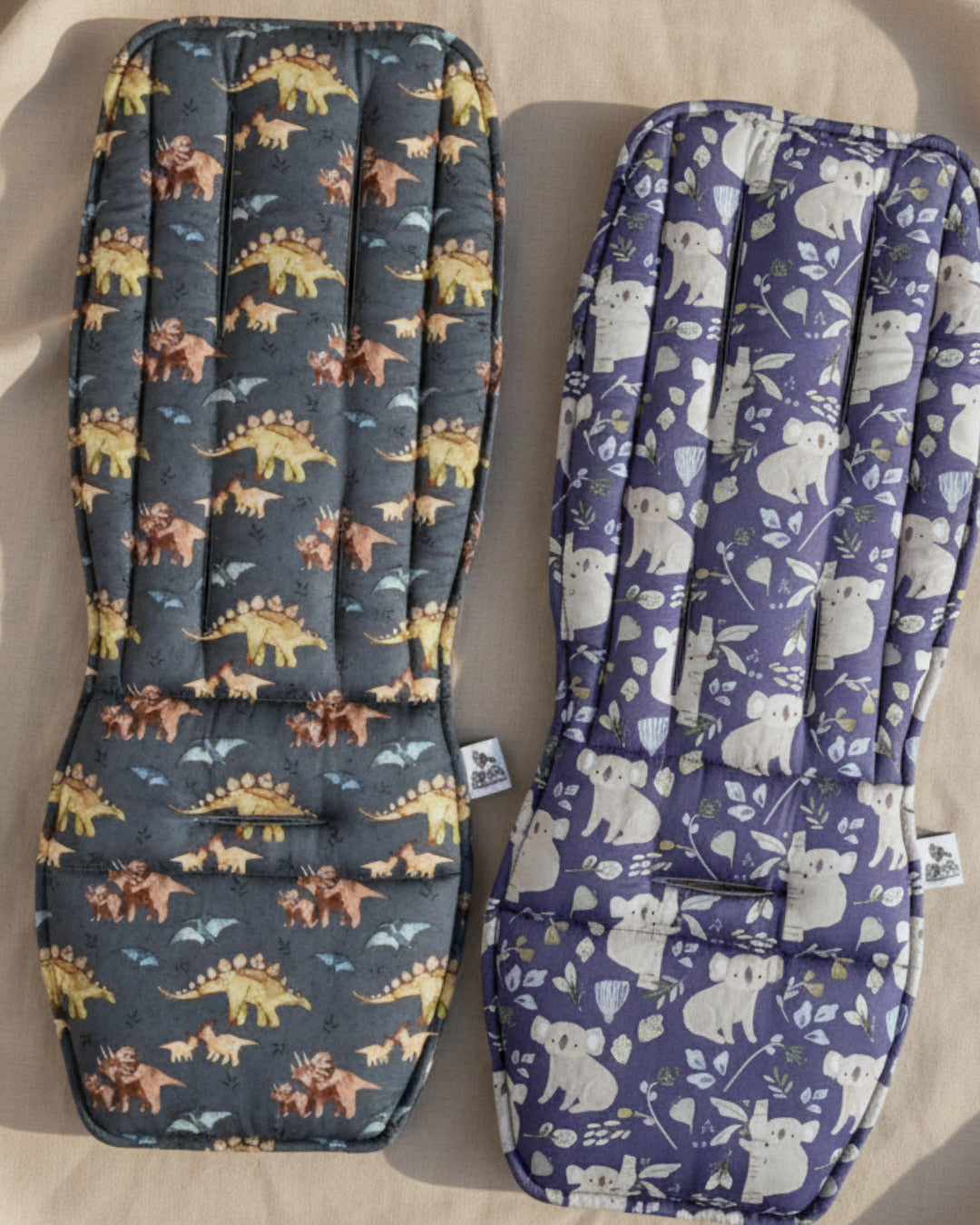 Two fabric pads with different patterns on a neutral background