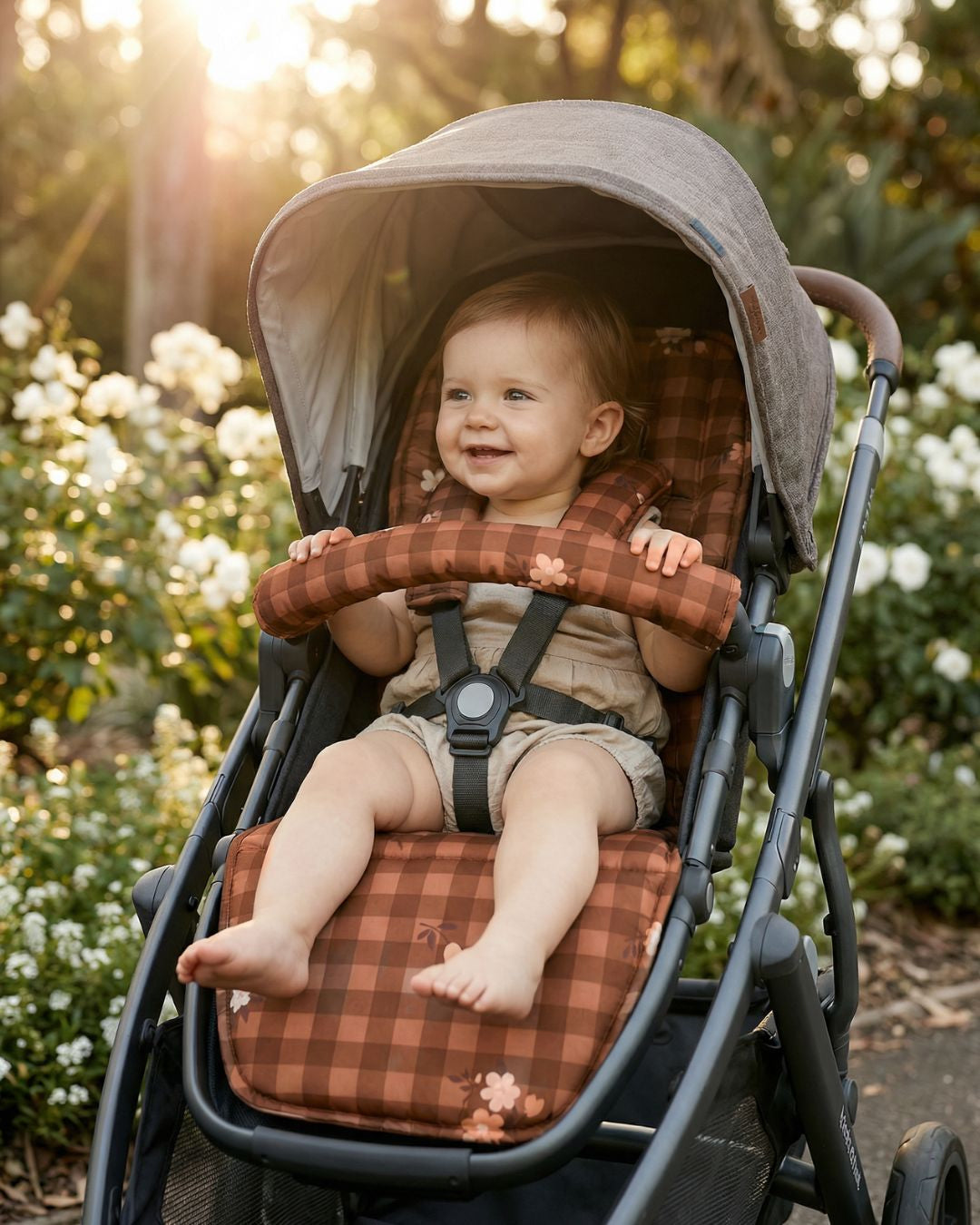 Baby sitting on Hailey padded universal pram liner