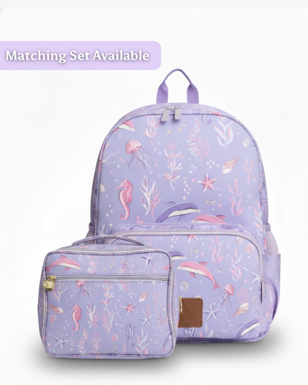 Purple backpack with sea-themed design on a white background