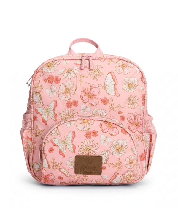 Pink backpack with floral and butterfly pattern on a white background