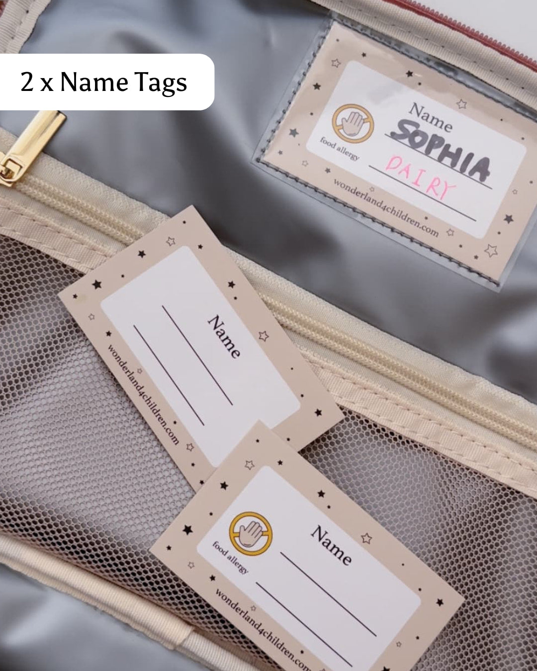 Three name tags on a mesh surface with '2 x Name Tags' text above.