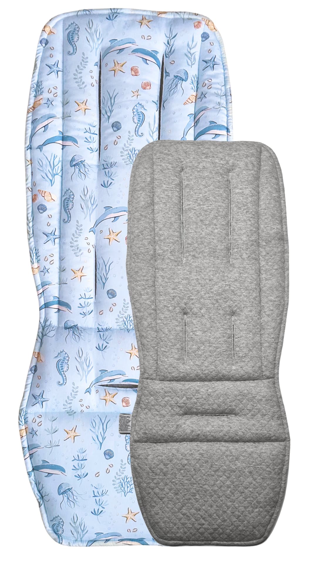 Baby stroller pad with ocean pattern and gray textured cover on a white background
